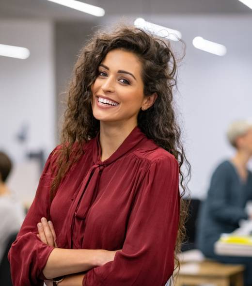 Successful,Businesswoman,Standing,In,Creative,Office,And,Looking,At,Camera