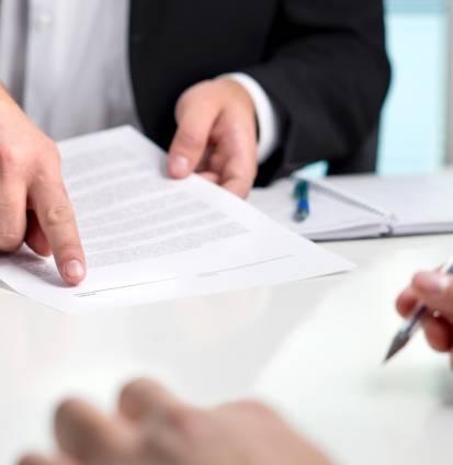 Signing,A,Contract,Or,Agreement.,Banker,Or,Lawyer,Showing,Client